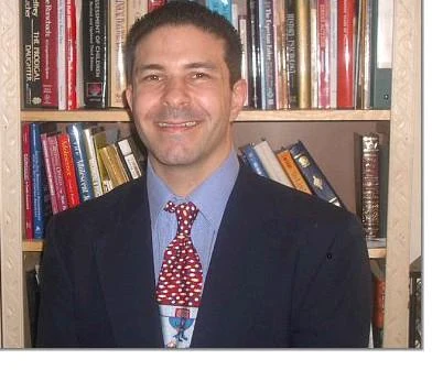 Dr. Steven Hartman, Psy.D. in his office